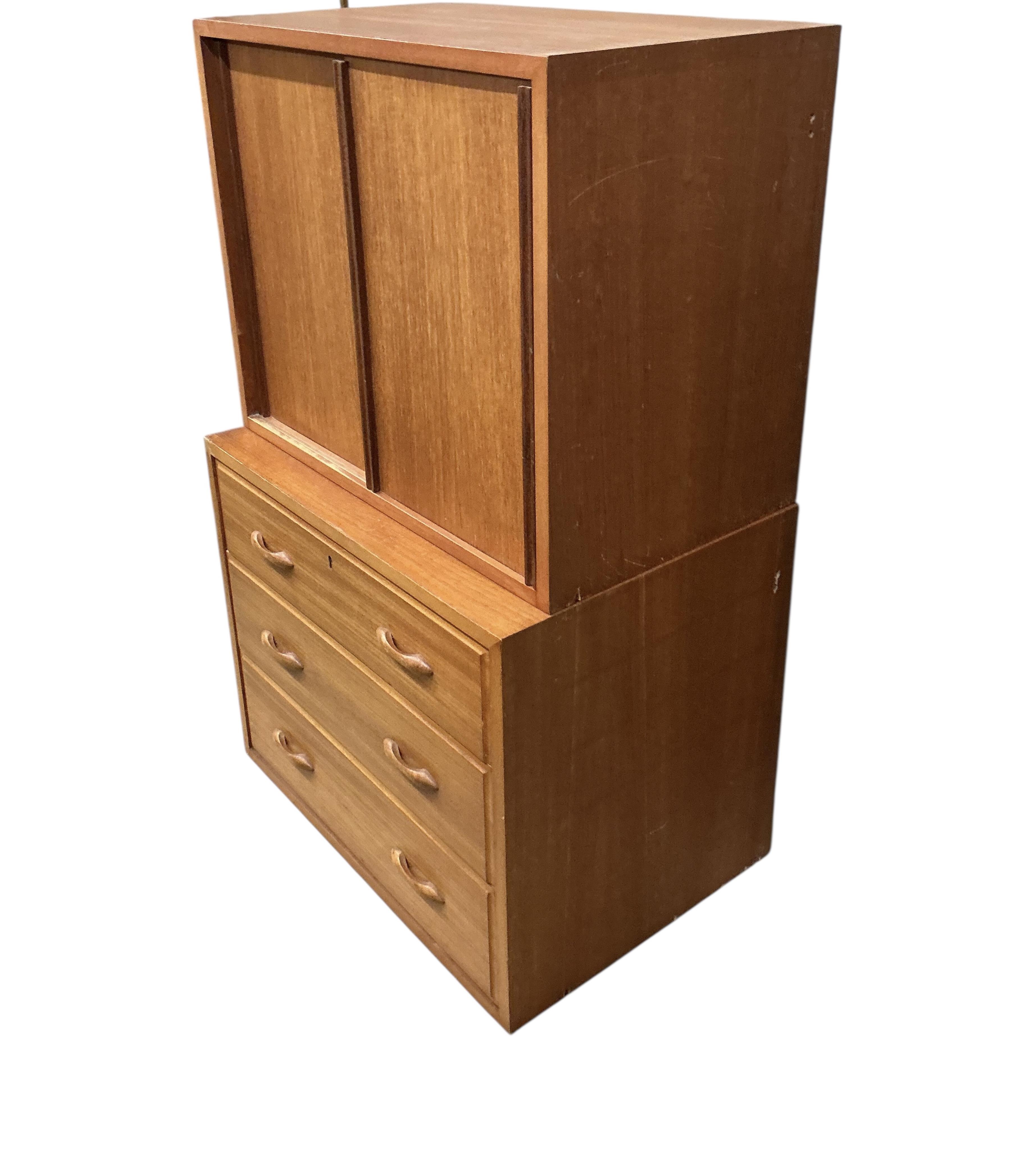 A Ladderax unit with wooden doors, larger width 59cm, depth 40cm, height 47cm together with a drawer unit